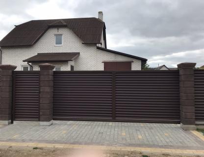 Ворота распашные и откатные от компании Юнистрейд
